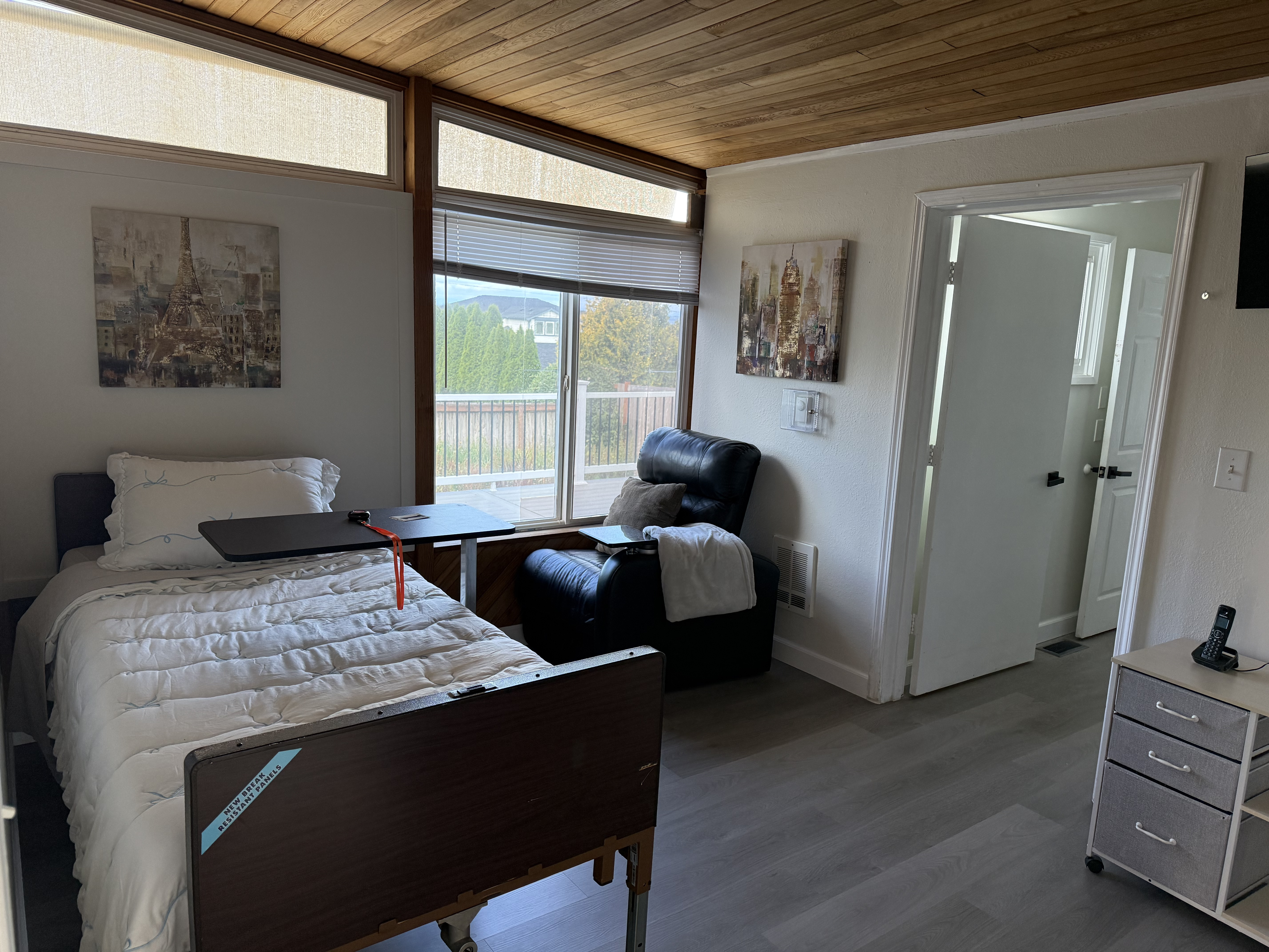 A calm, restful private bedroom suite at MD Care in the evening
